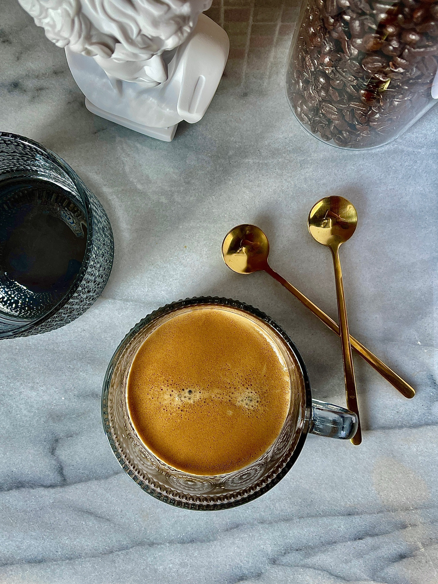 Morning Brew 😍☕️ - with the right coffee station set up you can enjoy the cafe experience in your home. 

Marble tray, marble board, vintage glassware, coffee glasses grey, vintage inspired coffee cup, coffee aesthetic, gold coffee spoons, coffee bean holder, kitchen canister, succulent planter,
Minimalist decor, Greek bust, Amazon home, Amazon kitchen

#LTKstyletip #LTKhome #LTKFind