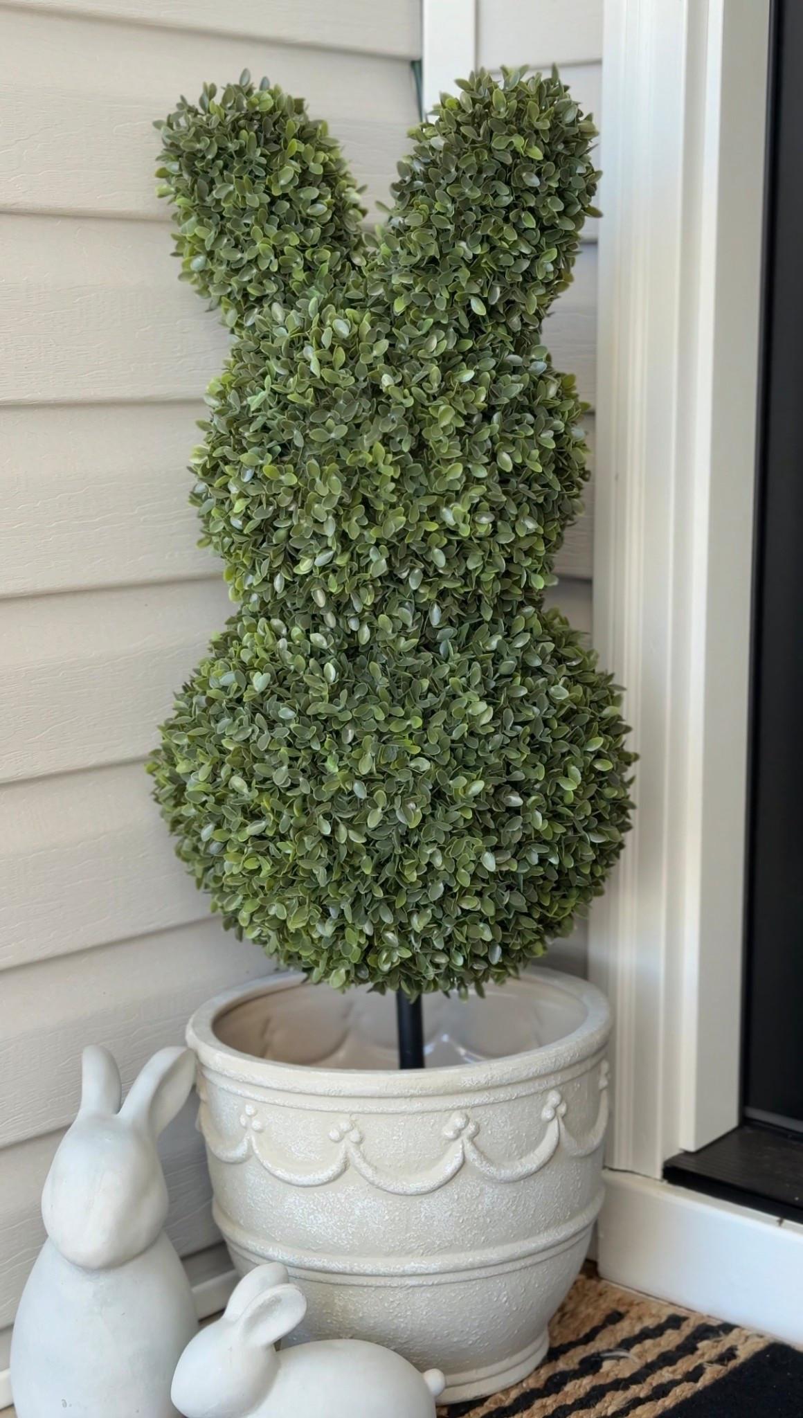 These boxwood, spring topiaries from Walmart are so cute! Perfect for  a spring porch refresh 🌸🐇