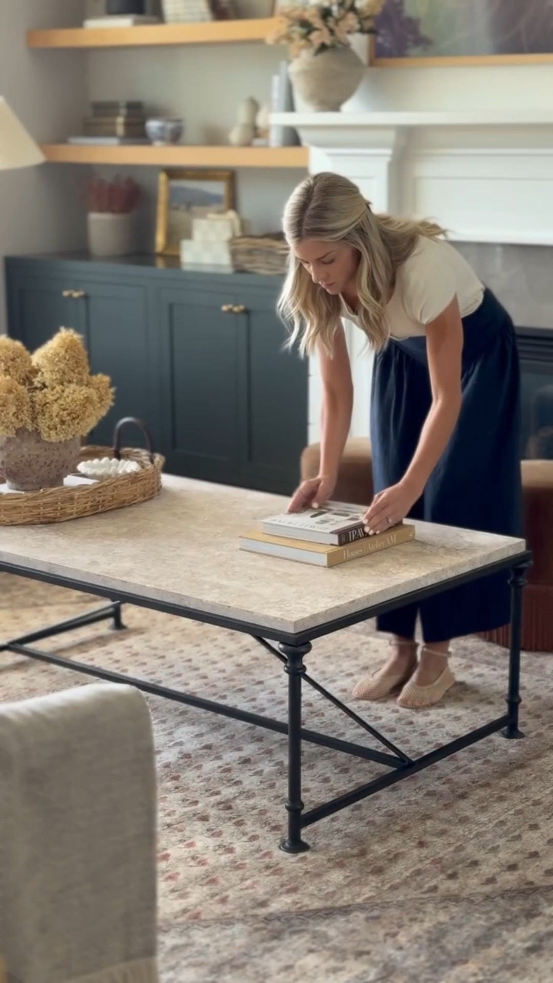 Our gorgeous travertine top iron base coffee table is on sale right now at Wayfair!! 43% off and now $1,361 which is the lowest price I have seen. FREE full service delivery as well! 

#LTKSaleAlert #LTKHome
