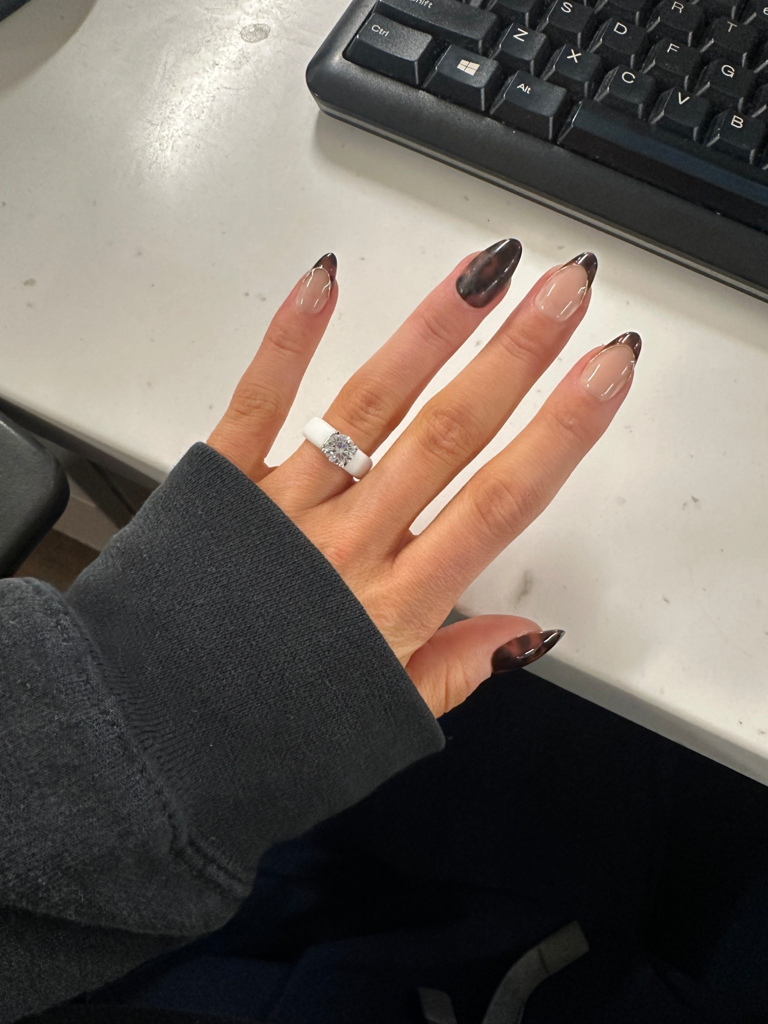 I’ve gotten so many compliments on this silicone ring, and it’s become my go-to for work, workouts, and everyday wear. It gives you the look of a real diamond with the comfort of a soft, flexible band, so you never have to worry about damaging your real ring. The round-cut stone looks so pretty on the finger, and it’s durable, lightweight, and perfect for anyone who needs something functional but still cute. Pair it with Glamnetic nails to complete this affordable, polished, and surprisingly luxe everyday look. 

#LTKGiftGuide #LTKWedding #LTKWorkwear