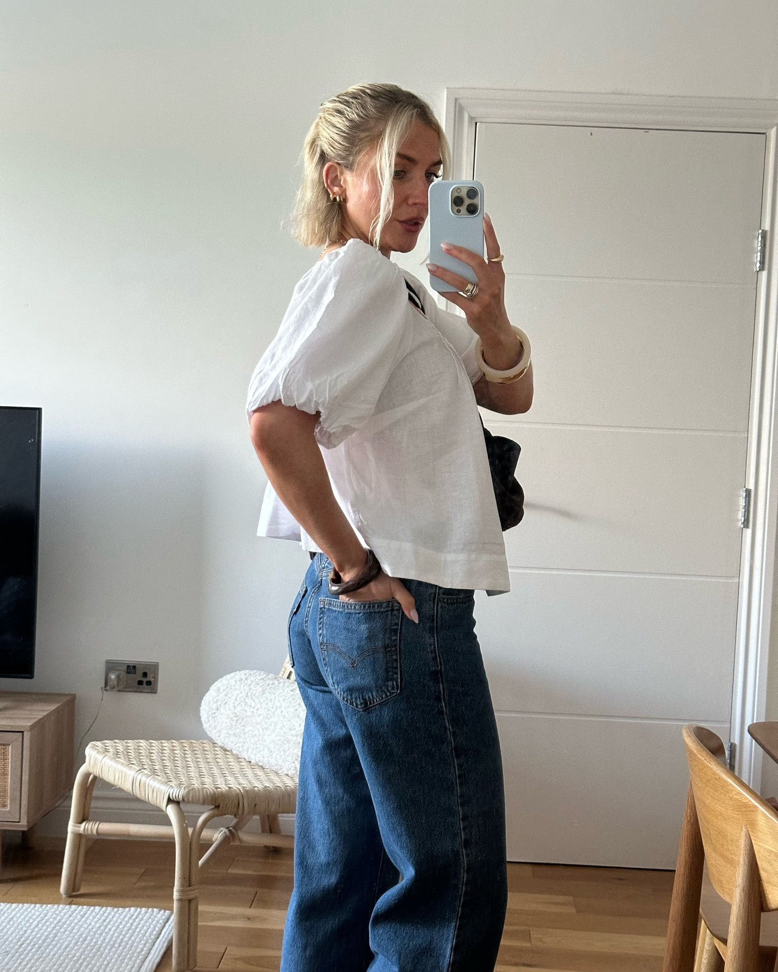 Levi’s jeans 
Straight leg Jeans 
Mid blue denim jeans 
White linen top 
Spring outfits 
Casual workwear

#LTKootd #LTKgrwm #LTKWorkwear