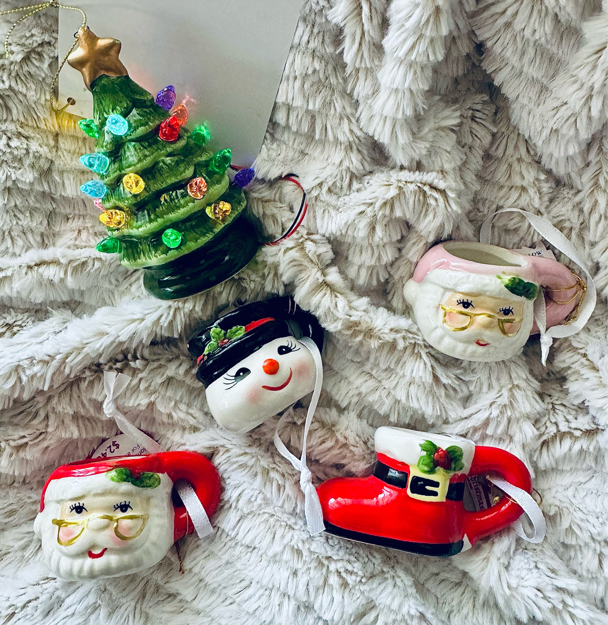 I’m absolutely obsessed with these adorable mini ceramic mug Christmas ornaments! 🤩 This year, the kids' elves will be bringing a tree and hot cocoa mugs for them to enjoy. Can’t wait to see their faces! 😆🎄

#LTKSeasonal #LTKGiftGuide #LTKHoliday