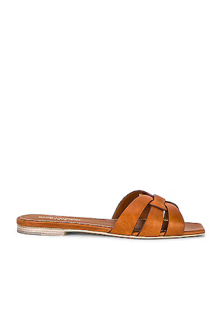 Saint Laurent Tribute Flat Sandal in Amber | FWRD | FWRD 