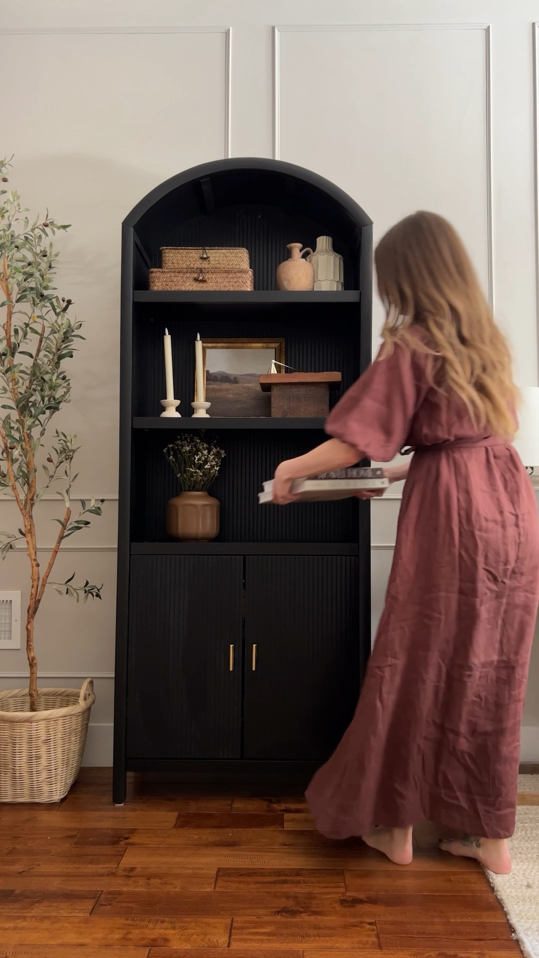 Shelf Styling Tips:

When styling shelves - embrace the magic of varying heights and textures to curate a captivating display. 

Textures add depth and visual interest, while varying heights create a dynamic flow. 

Candles (I use the flameless battery operated kind) create warmth, while small framed art adds a personal touch. 

Here’s what I used for that perfect shelf styling balance: 

Woven boxes, vases and vessels, small framed art, candles, wooden pedestal, dried florals, coffee table books, and a marble chain. 

#LTKFind #LTKhome