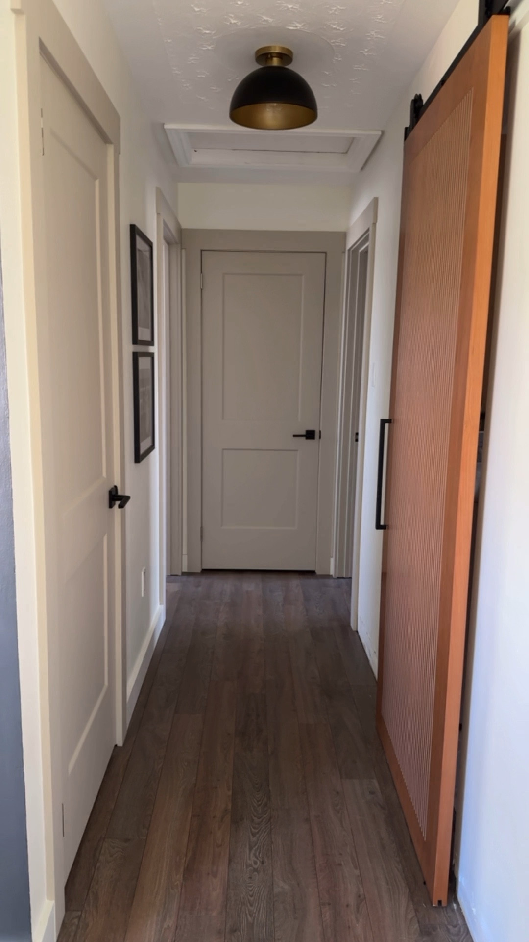 This hallway refresh was everything! Linking photo frames and hardware used for this renovation. Other items not able to be linked is barn door from Home Depot and paint is sherwin Williams in the color Shiitake! Contemporary modern home. Earthy neutral organic  

#LTKhome #LTKcanada
