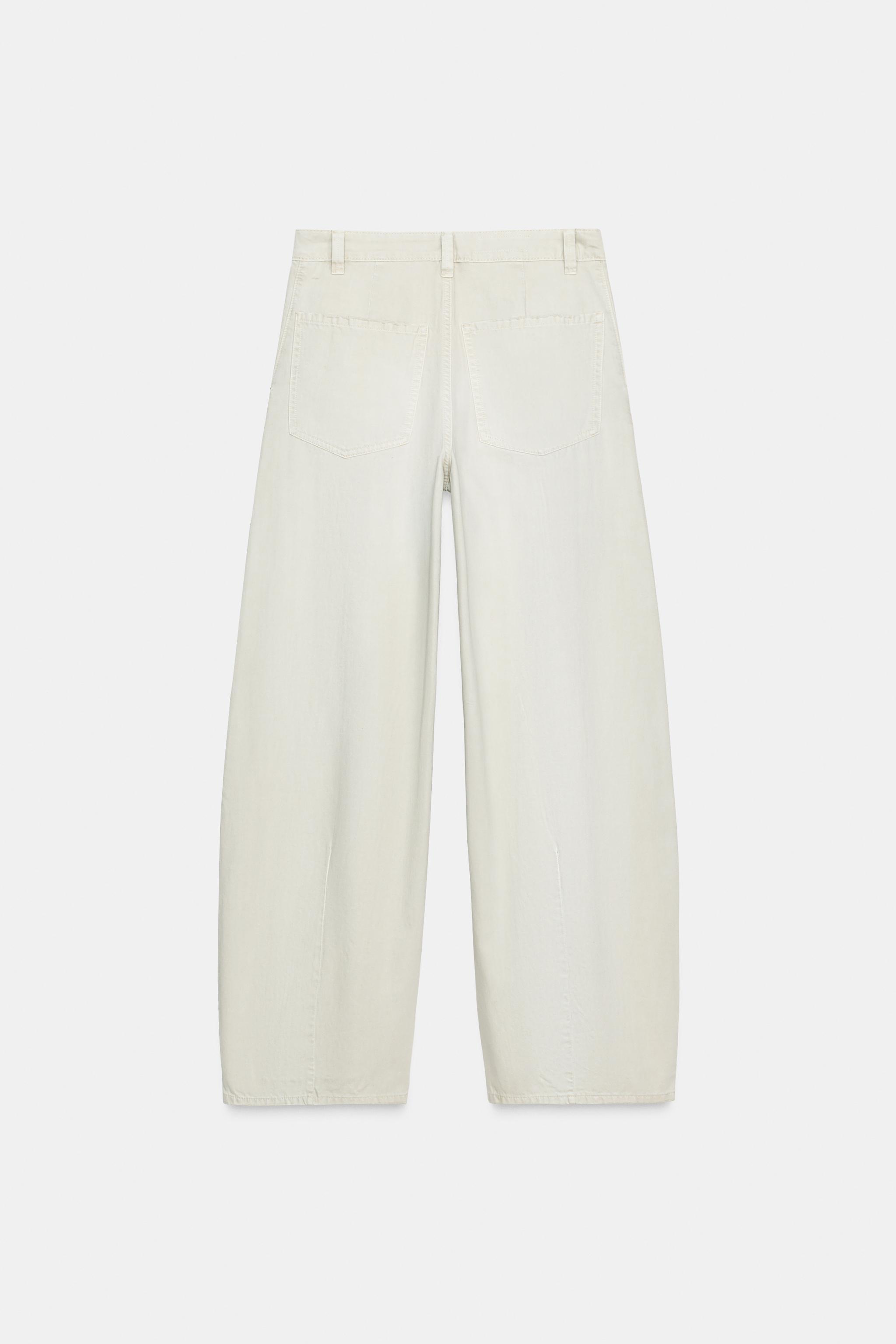 Mid-rise pants with belt loops. Side pockets and back patch pockets. Front pleat detail. Front zi... | Zara US