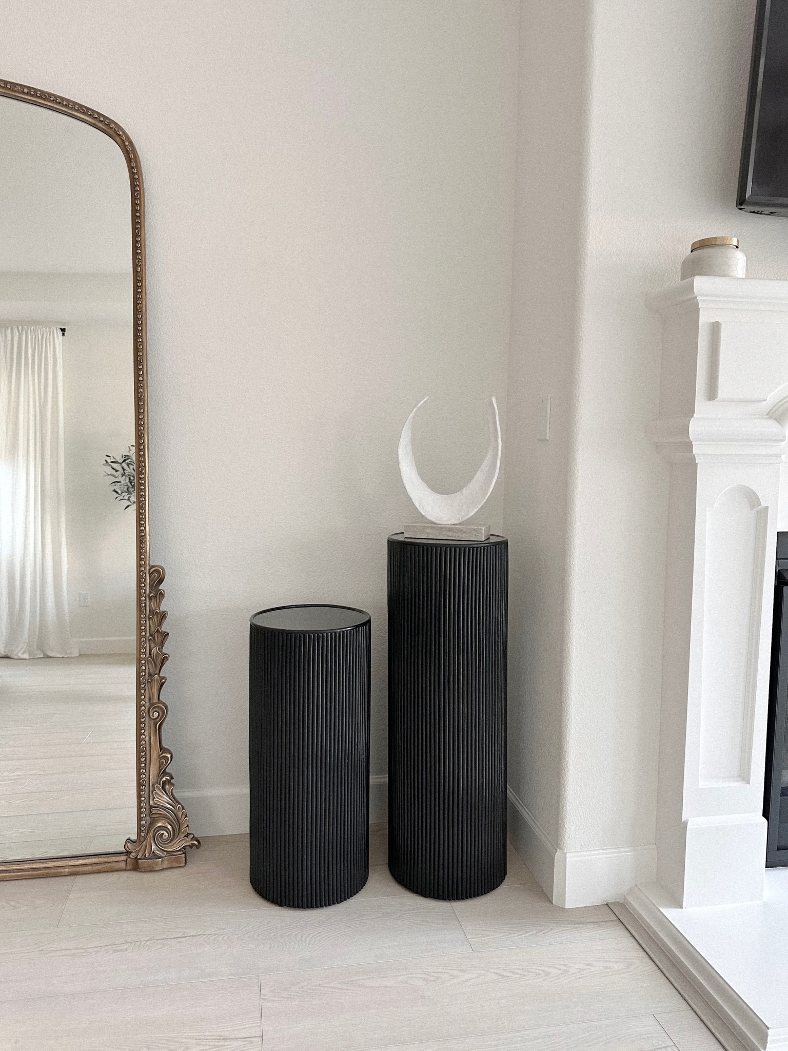 CB2 decorative pedestal and sculpture 

#LTKhome #LTKFind #LTKfamily