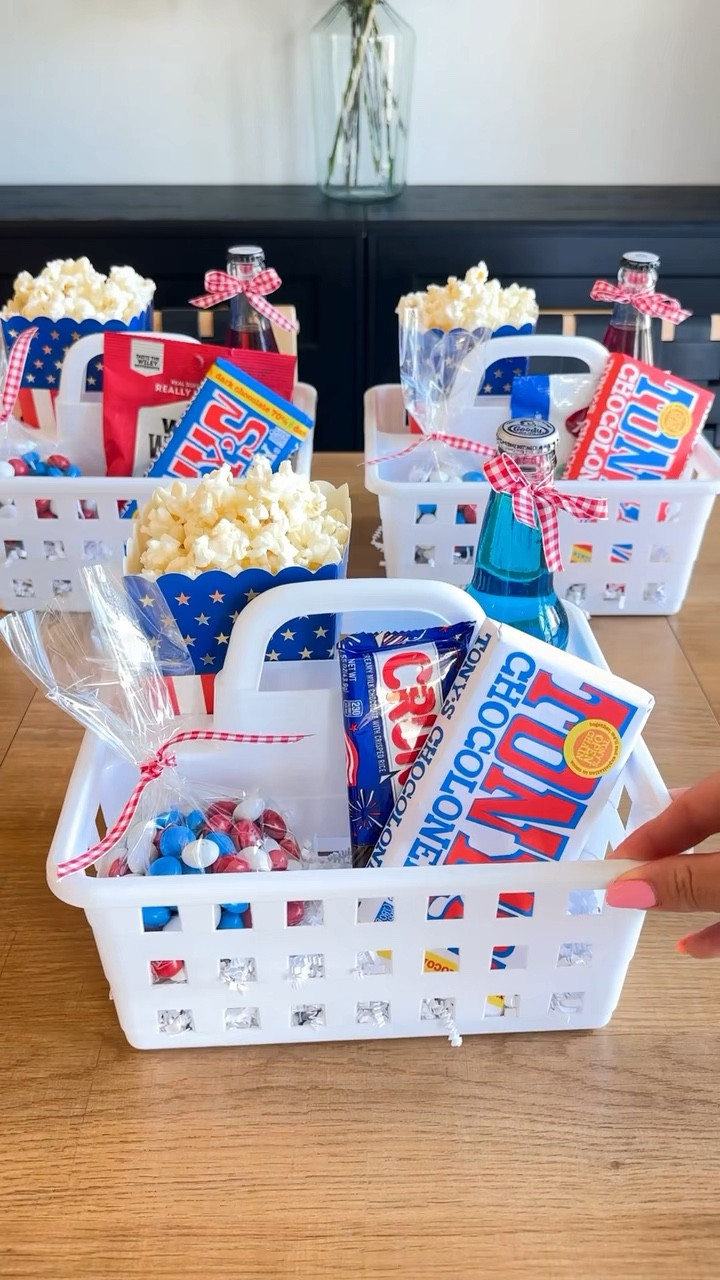 Hosting a 4th of July outdoor movie night? These festive treat caddies from Dollar Tree are the perfect way to serve up snacks in red, white, and blue style! I filled each caddy with patriotic snacks and drinks for a fun and easy way to keep treats organized and mess-free during our backyard movie night.
Here’s what I added to each one:
	•	Red, white & blue candy and snacks
	•	Mini sodas and juice pouches
	•	Popcorn bags
	•	Glow sticks for extra fun after dark
These Dollar Tree snack caddies are super affordable, reusable, and make your 4th of July movie night feel extra special. Whether you’re watching fireworks, a patriotic film, or just gathering with friends, this is such an easy win for your party setup.

4th of July party ideas, backyard movie night, snack caddies, Dollar Tree finds, patriotic snacks, red white and blue treats, Independence Day party, outdoor celebration ideas, party snack setup, festive family fun

#LTKSeasonal #LTKFamily #LTKKids