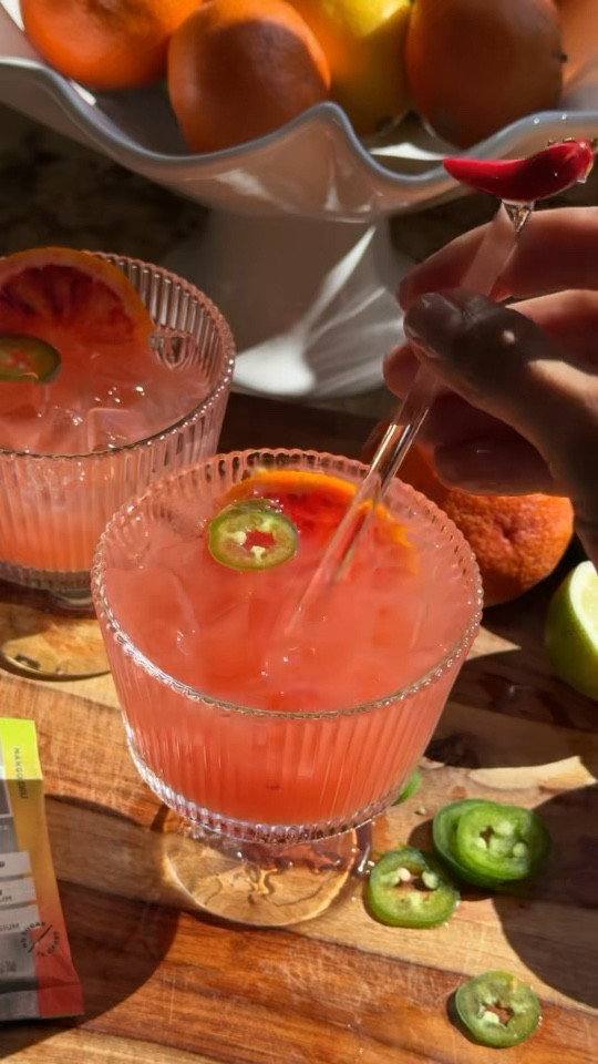 SAVE this post for the recipe below! If you’re drinking alcohol, do you “bookend” with something hydrating before and after each drink?  This is a great Mocktail anytime you don’t want alcohol, or you can use it to bookend, and the @drinkLMNT electrolytes will give you some extra recovery :) Comment LINK for a free sample pack of @drinkLMNT flavors! #LMNTPartner   

 

MANGO BLOOD ORANGE SPICY MARGARITA MOCKTAIL 

 

INGREDIENTS: 

1/4 cup lime juice  

1/3 cup blood orange juice  

1 pack @drinkLMNT Mango Chili  

4 jalapeño slices, set aside 2 for garnish  

3/4 cup sparkling water (I used lime flavored) 

Ice 

 

DIRECTIONS:  

1. Combine everything but sparkling water  

in a cocktail shaker with ice and shake. 

2. Pour juice/LMNT mixture into two glasses over ice  

3. Pour sparkling water as a final step 

4. Garnish with jalapeño and a blood orange slice.    

#LTKWatchNow #LTKHome #LTKOver40