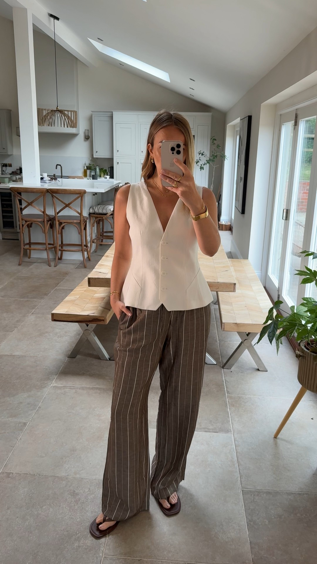 One of my favourite spring/summer outfit formulas … 
Waistcoat and relaxed linen pants … always looks chic & effortless and can be styled up and down to suit the occasion. 

This waistcoat is one of the nicest tailored waistcoats I’ve seen - beautiful fabric , hourglass cut which makes it stand out as a special piece.
Perfect for an occasion - wearing a 
Large - I’d say fits more like a 12 12/14. 
I’ve been buying these trousers for the past few weeks and they are near sold out now - I’ve linked them as there is still stock in store and other colourways available. 
Wearing a medium 

Summer outfit formula 
Waistcoat 
Linen trousers 
Stripe trousers 
Occasion outfit 
Holiday outfit 
Stylish workwear 

#LTKworkwear #LTKsummer #LTKmidsize