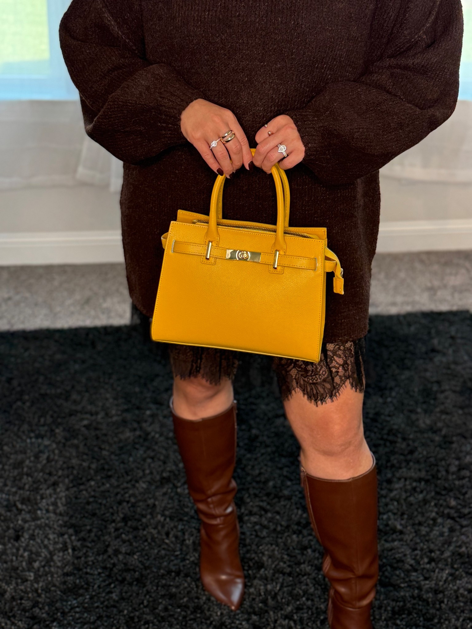 Obsessed with this purse and boots 💛🤎

#LTKFindsUnder50 #LTKOver40 #LTKShoeCrush