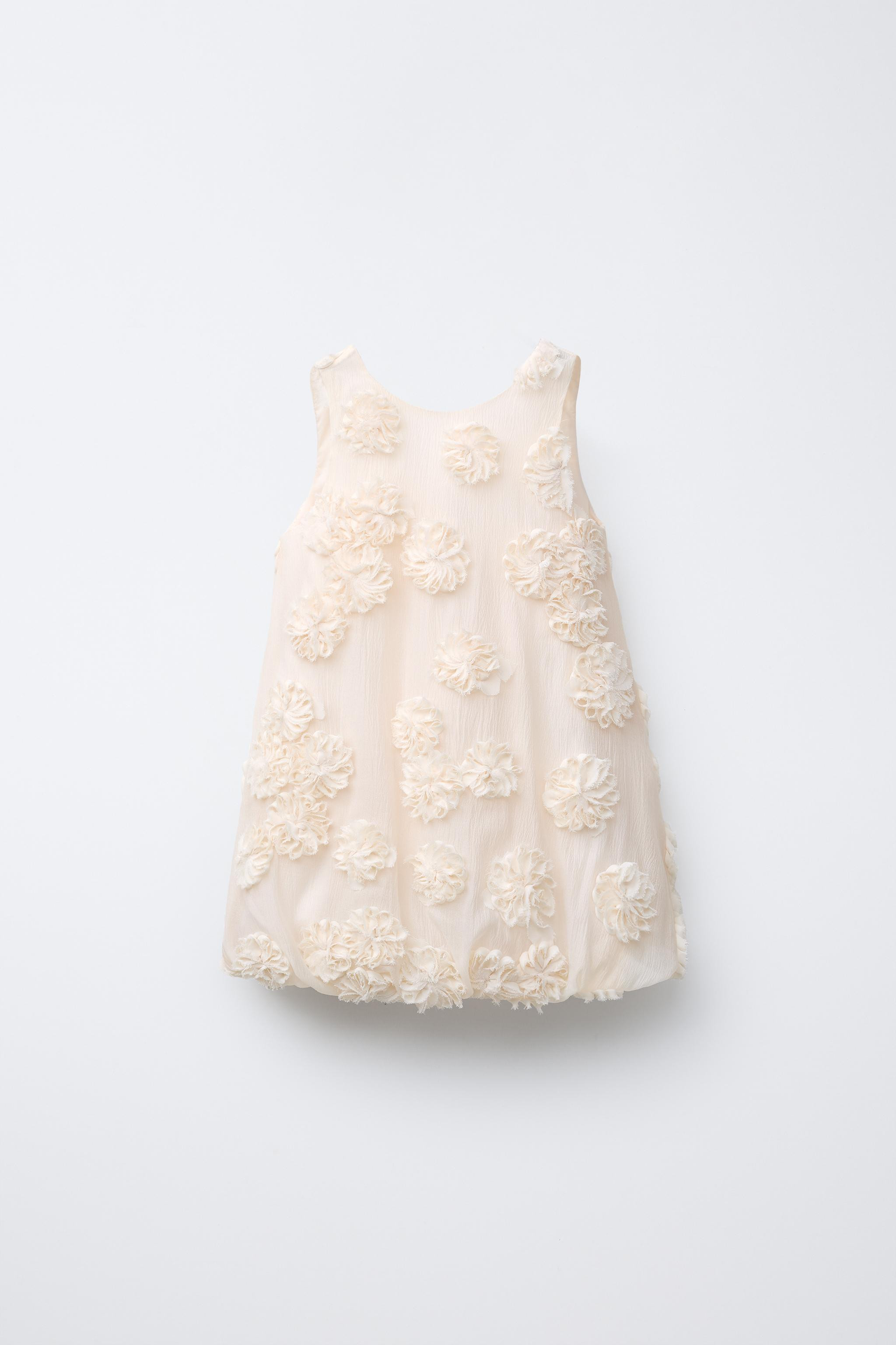 Balloon-shaped dress with a round neck and sleeveless design. Teardrop button closure at back. Or... | Zara US