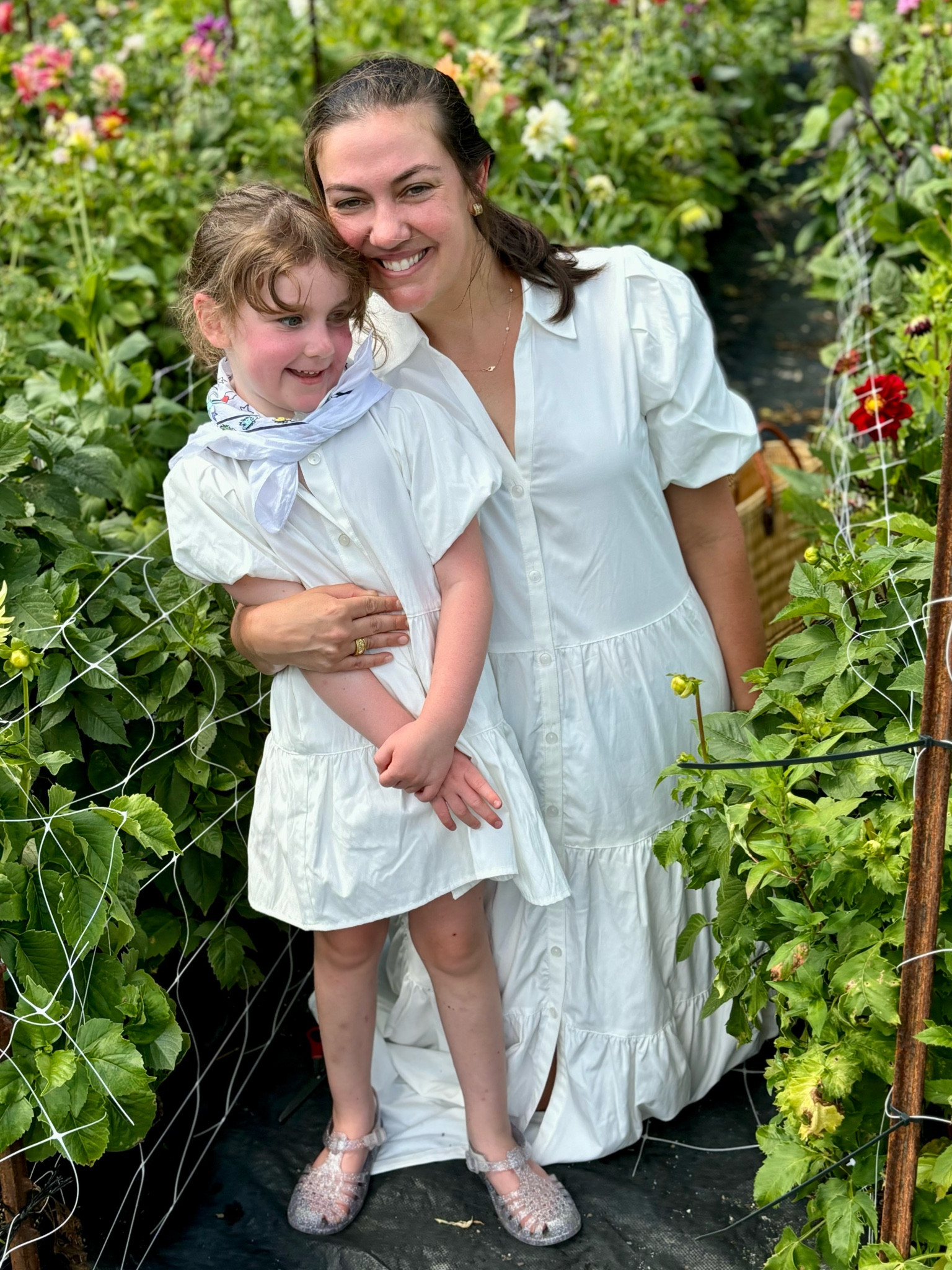 Dahlia season 🌿✂️. 

I’ve said it once and will say it again. If you are heading to western Carolina this summer, one of our favorite spots + best kept secrets in town is Scotlyn’s Yard. Located right off of Hwy 107 and about 5 minutes outside of downtown Cashiers, NC — Scotlyn’s Yard is a nursery where you can pick your own Dahlia flowers (on the honor system!) when blooming. 

Louisa and I are styling in matching @brochuwalker dresses that I have long admired for the flattering silhouette of their best-selling (Havana) dress. I believe it lives up to the hype! We adore ours and are excited to have beautiful dahlia blooms around our home this week! 

#cashiers #highlandsnc #summerblooms #dahlias #bronchuwalker #dahliafield #flowerfarm