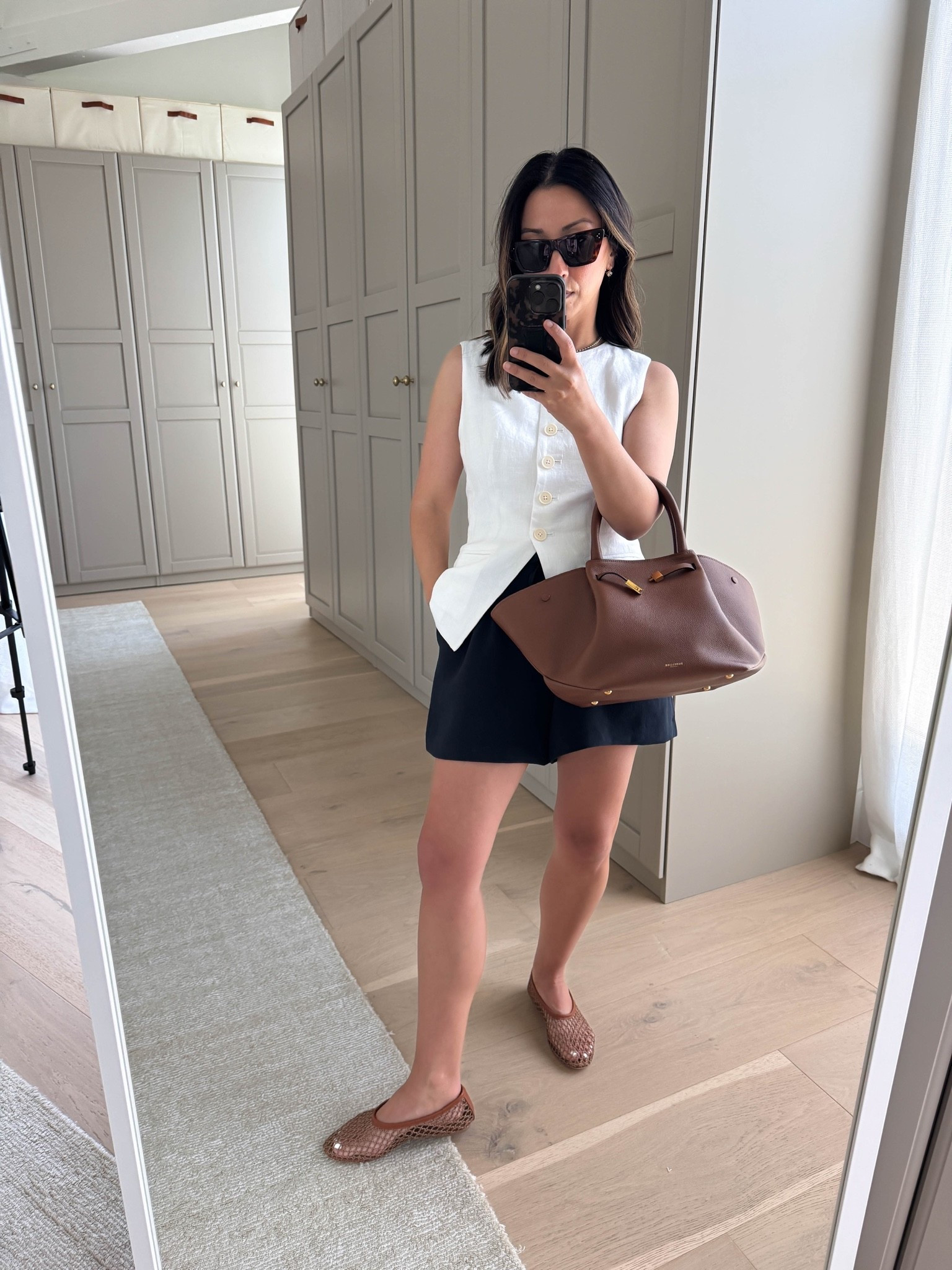 Daily outfit: 2 polished pieces that will change your summer wardrobe. 

J.crew line vest 0
Aritzia lodge shorts small
Staud flats 35
DeMellier New York bag midi
Celine sunglasses 
Dorsey James necklace 15”
Electric Picks earrings

summer outfits, summer style, petite style

#LTKmomlife #LTKootd #LTKPetite