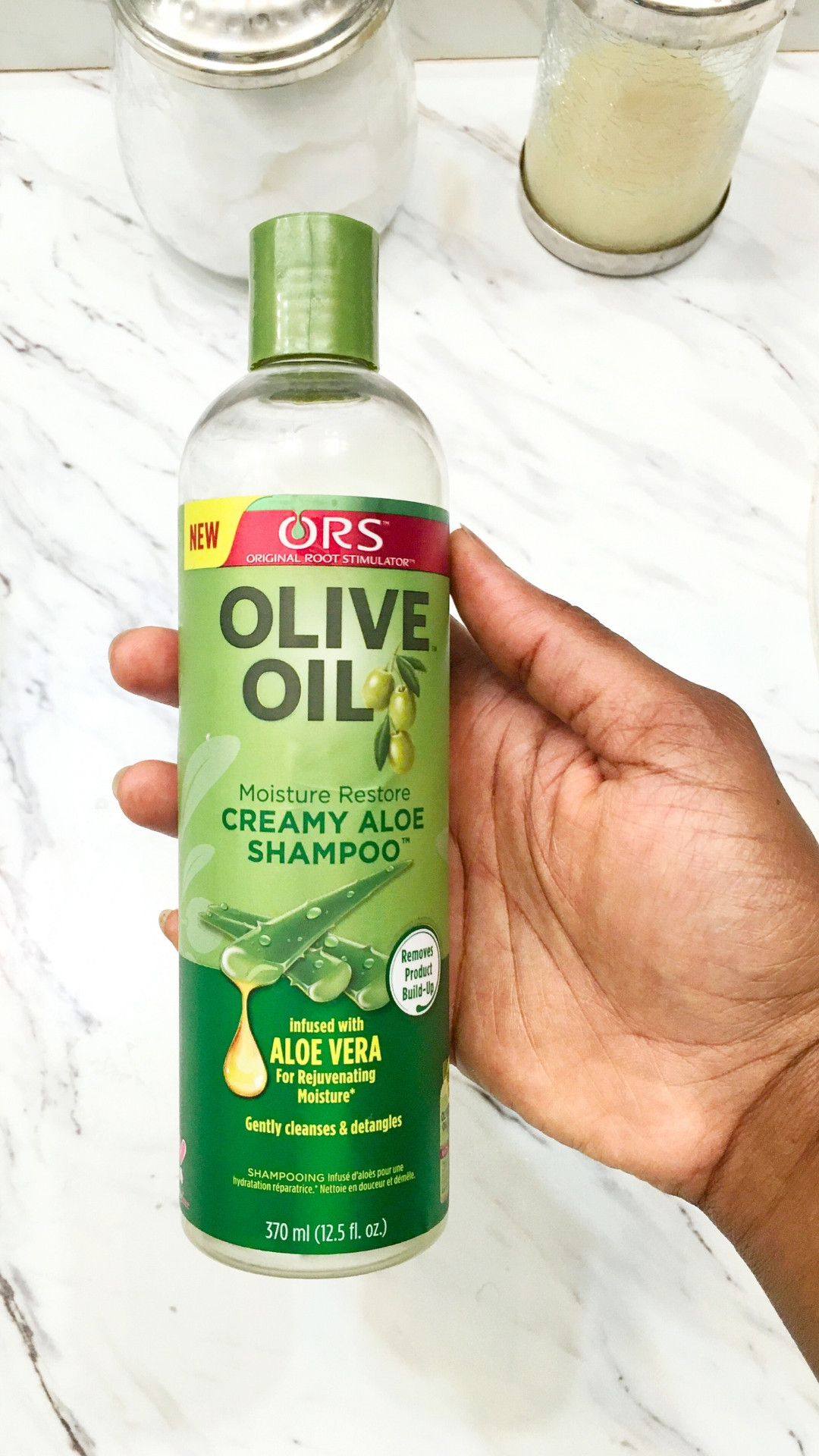 I’m all about the ORS Olive Oil Creamy Aloe Shampoo. It’s my go-to clarifying shampoo, especially for relaxed hair!

Here’s why I reach for it: ✔️ It gently cleanses without stripping natural oils ✔️ Helps remove buildup (goodbye product residue and dull relaxer layers) ✔️ Leaves hair soft, tangle-free, and shiny ✔️ It’s affordable  ✔️ Bonus: it’s sulfate-free (or at least ORS lists it that way) so it doesn’t feel overly harsh on my strands

I usually use it at most once a month (even though it claims weekly use) because it’s potent when cleaning deeply, and my hair doesn’t need that level of cleansing all the time. It’s become my top recommendation in my lineup of clarifiers.

Want to see how it works on your hair? I’ve got the link waiting for you in my LTK. Give it a try and let me know if your hair feels as revived as mine does.

#hairproducts #relaxedhaircare 

#LTKBeauty #LTKStyleTip