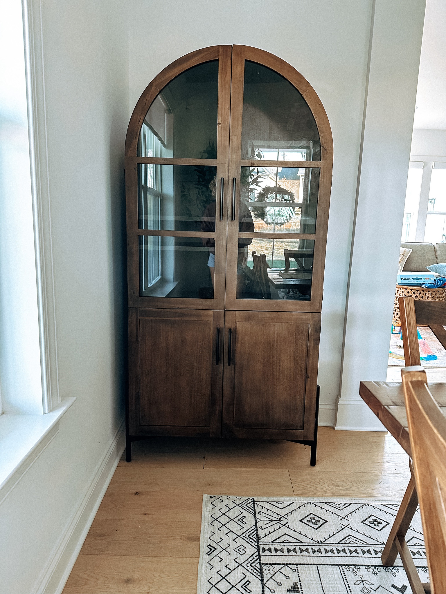 Most gorgeous arched cabinet. Love the dark wood 😍

#LTKHome