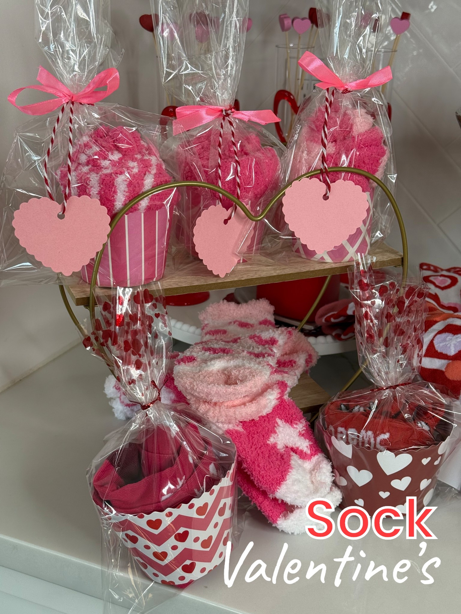 Ditch the silly Valentines cards and hand out socks in a cute cupcake wrapper instead! They are available in dress socks or fuzzy socks. They come with everything you need to put these together! #valentinesgiftguide #vday #valentinesday

#LTKValentine #LTKSeasonal #LTKKids