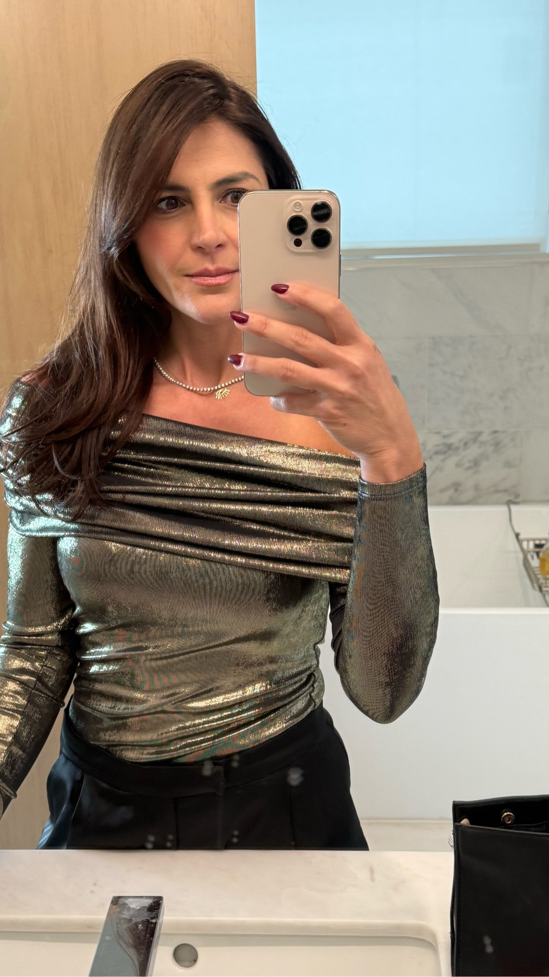 Your last outfit of the year has to be an iconic one✨ ⁠
⁠
This golden off-the-shoulder top paired with billowy satin pants makes for a New Year’s Eve look that’s chic and comfy enough to dance the night away🪩🥂

Pants are @zara

#LTKootd #LTKgrwm #LTKHoliday