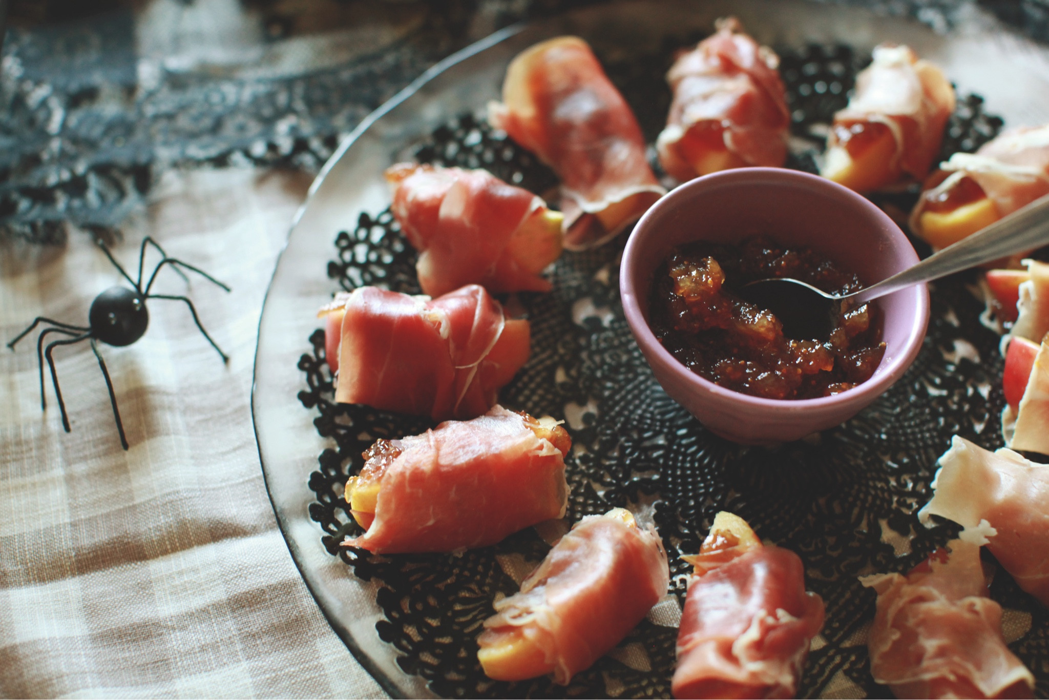 I made this appetizer last year for Thanksgiving and it was a big hit so I brought it back for our fall birthday party. You just need 3 medium bodied apples, 2 packages of prosciutto and fig jam. I spread the jam and the apple slices and then roll prosciutto around them. This lace platter from Anthropologie inspired my entire party decor theme so it definitely deserved holding the “best” appetizer 🍎🖤🕷️

#LTKSeasonal #LTKParties #LTKHalloween