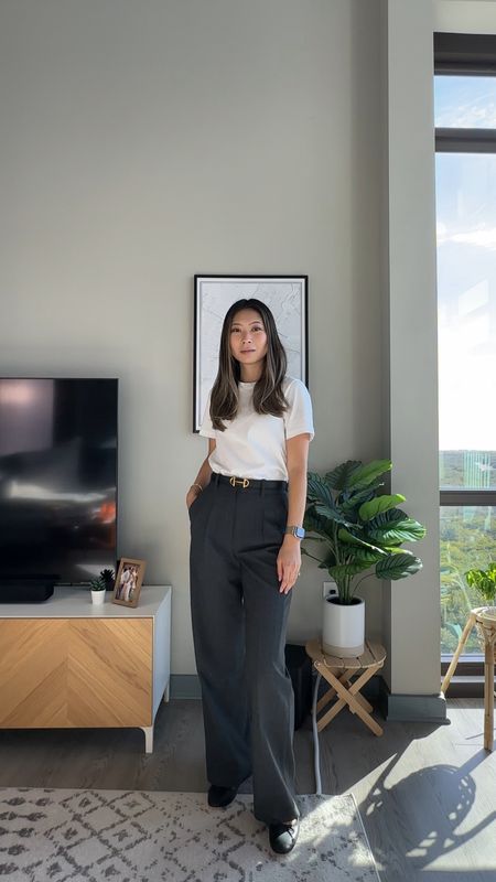 Casual chic everyday workwear outfit // white t shirt, black belt, gray tailored pants, black ballet flats // business casual, french style, parisian chic

#LTKfindsunder100 #LTKstyletip #LTKworkwear
