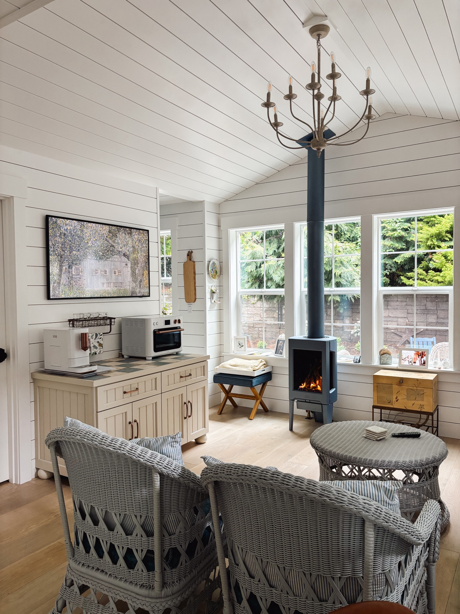 Tiny cottage living room - chandelier, frame tv, espresso machine, toaster oven, blue white tile

#LTKSeasonal #LTKSaleAlert #LTKHome