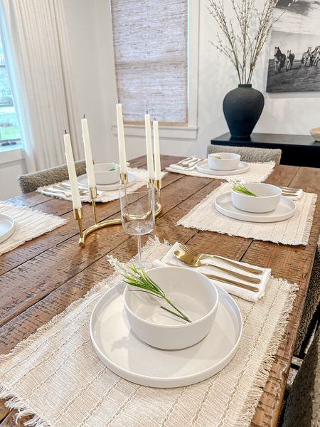 Indoor/Outdoor Melamine Dinnerware. Neutral home. Entertaining. Plates, bowls,  linen napkins, candle holder, wood table, wine glass, vase, curtains, dining chair.