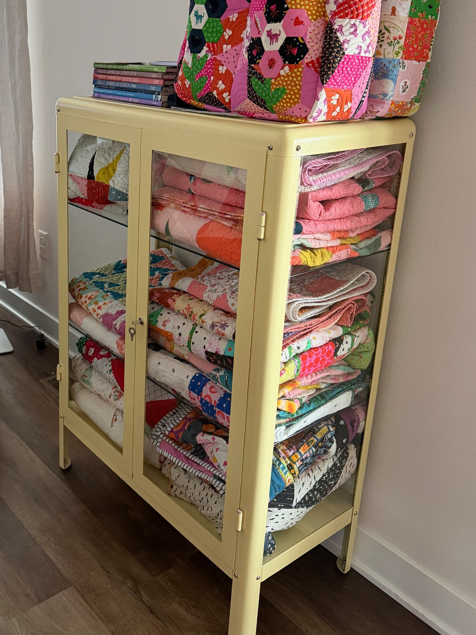 Affordable cabinet to display and store quilts! 

#LTKHome #LTKmomlife #LTKvlog