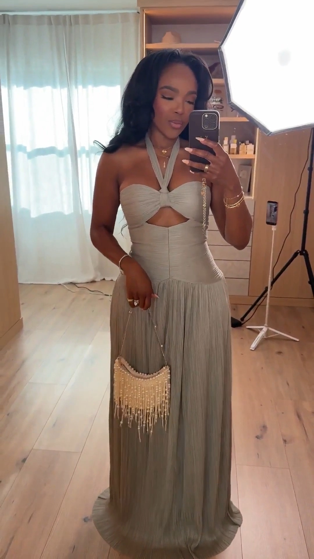 Hi babes ✨ Scroll to shop this soft glam neutral maxi dress 🤍

This flowy pleated halter maxi with the cutout detail is one of those statement pieces that still feels effortless. The flattering silhouette and soft neutral tone make it so easy to dress up or down, giving you endless styling options while keeping the cost per wear low over time.

Perfect for vacations, weddings, date nights, bridal events, or summer occasions.

📏 Measurements: 5’4”, 140 lbs, 34D bust, 27” waist, 40” hips  
Wearing a size Small

#LTKgrwm #LTKootd #LTKvlog