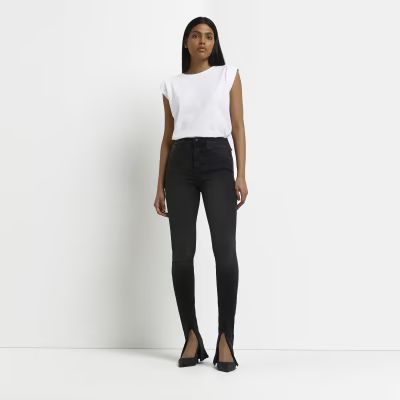 Black high waisted skinny jeans | River Island (UK & IE)