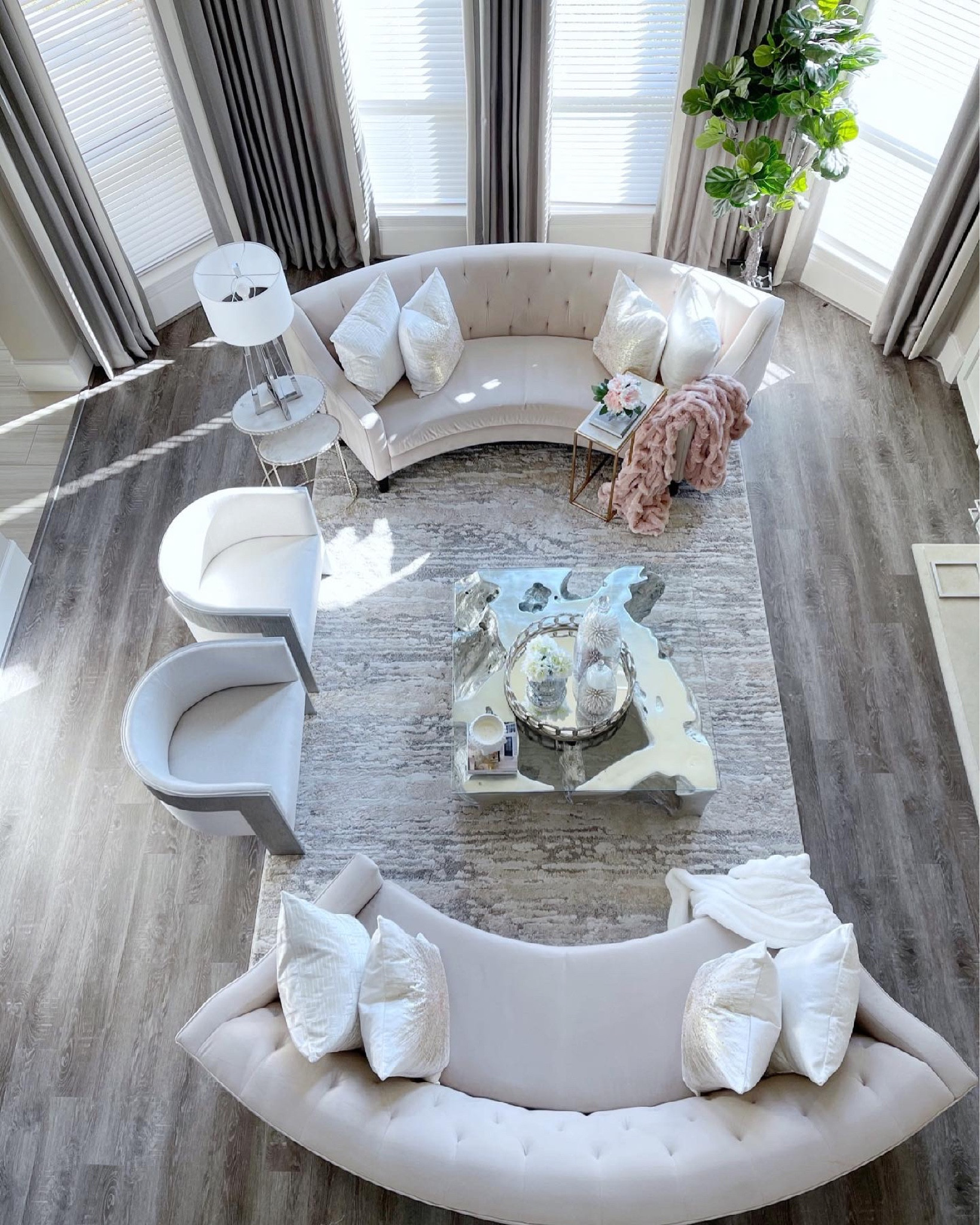 One of my favorite views in my home! #homedecor #curvedcouches #curvedsofas #livingroom #familyroom 

#LTKsalealert #LTKhome #LTKFind