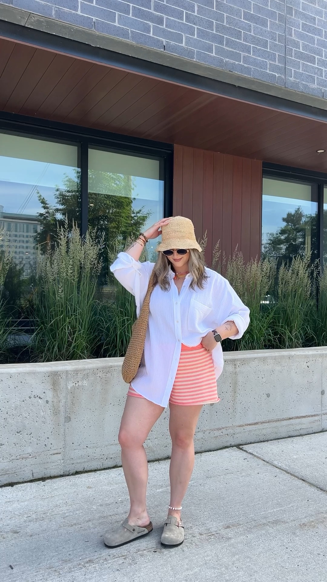Beach outfit! Wearing my usual size L in both the striped shorts and oversized white button up. I’m a 9.5-10 and wear a 40 in the Birkenstock Boston clogs. Linked similar straw bucket hats

#LTKsummer #LTKmidsize #LTKsale