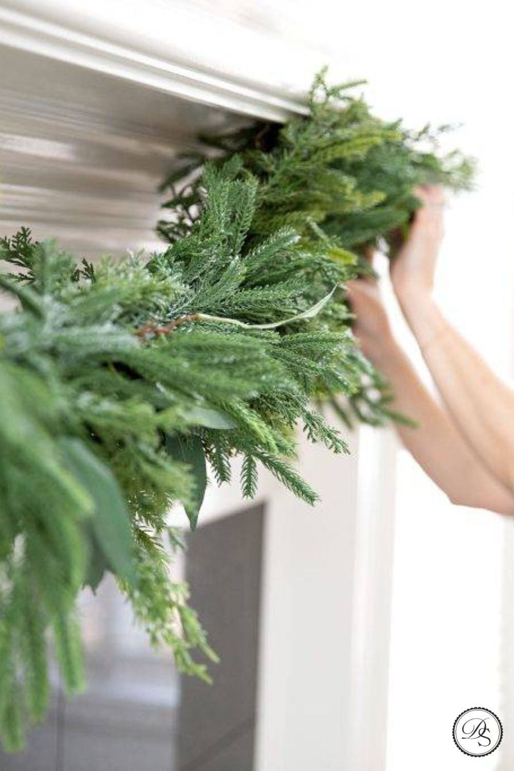 One of my favorite ways to style my garlands is a very full and asymmetrical mantel. The trick to getting it to look its best is to hang it loose enough for the garland to naturally drape in between where it is hooked. 

 #garland #Christmasgarland #holidaygarland #fauxgarland #mantelgarland #Christmasdecor #Christmasdecorations #Christmasmantel #LTKHoliday #LTKSeasonal #LTKStyleTip
