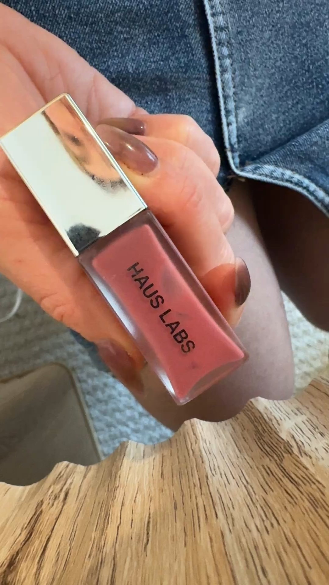 Swatching haus of labs in macaron lip gloss goes with every outfit. 

#LTKBeauty #LTKValentine #LTKgrwm