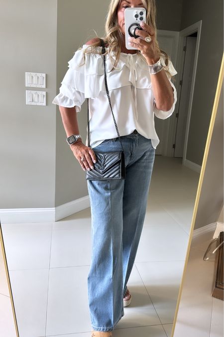 Love this off the shoulder top from amazon. I’m in a M. And the jeans are so good! TTS date night outfit. Girls night outfit  

#LTKOver40 #LTKItBag #LTKFindsUnder100