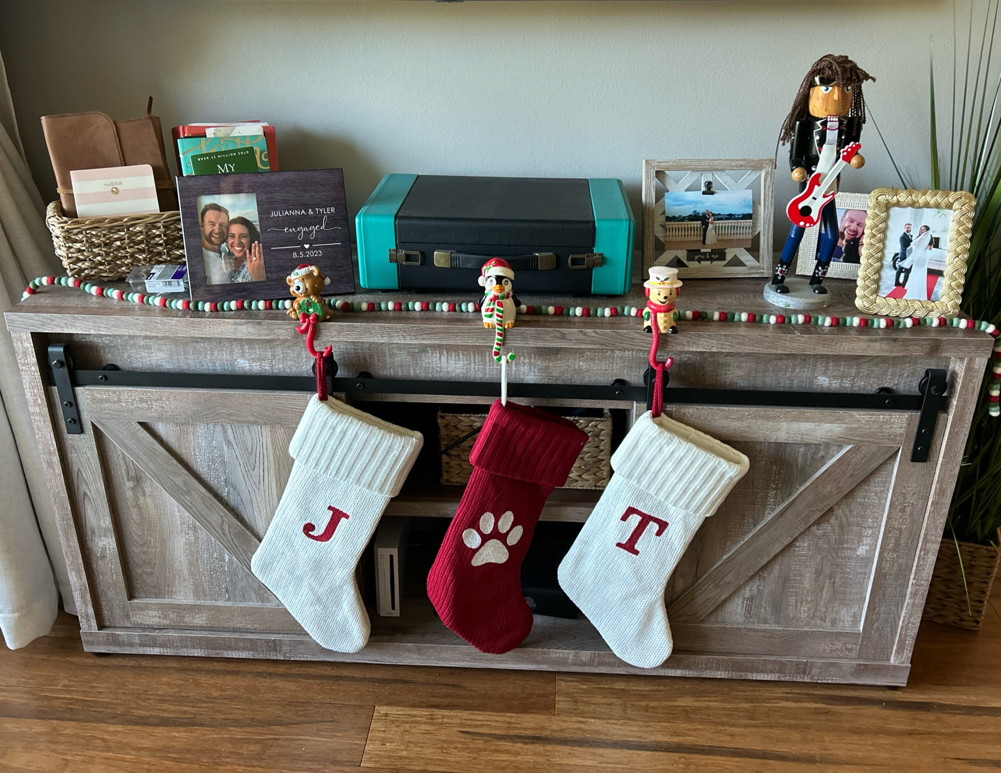 The cutest mantel in our first home!!

#stocking #christmasdecore #firstchristmas #christmas #homey #neutral #basic #farmhouse #garland #nutcracker #mantel #initials #red #white 

#LTKSeasonal #LTKGiftGuide #LTKFindsUnder50