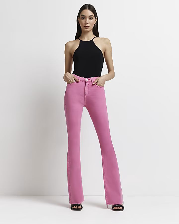 Pink mid rise flared jeans | River Island (UK & IE)