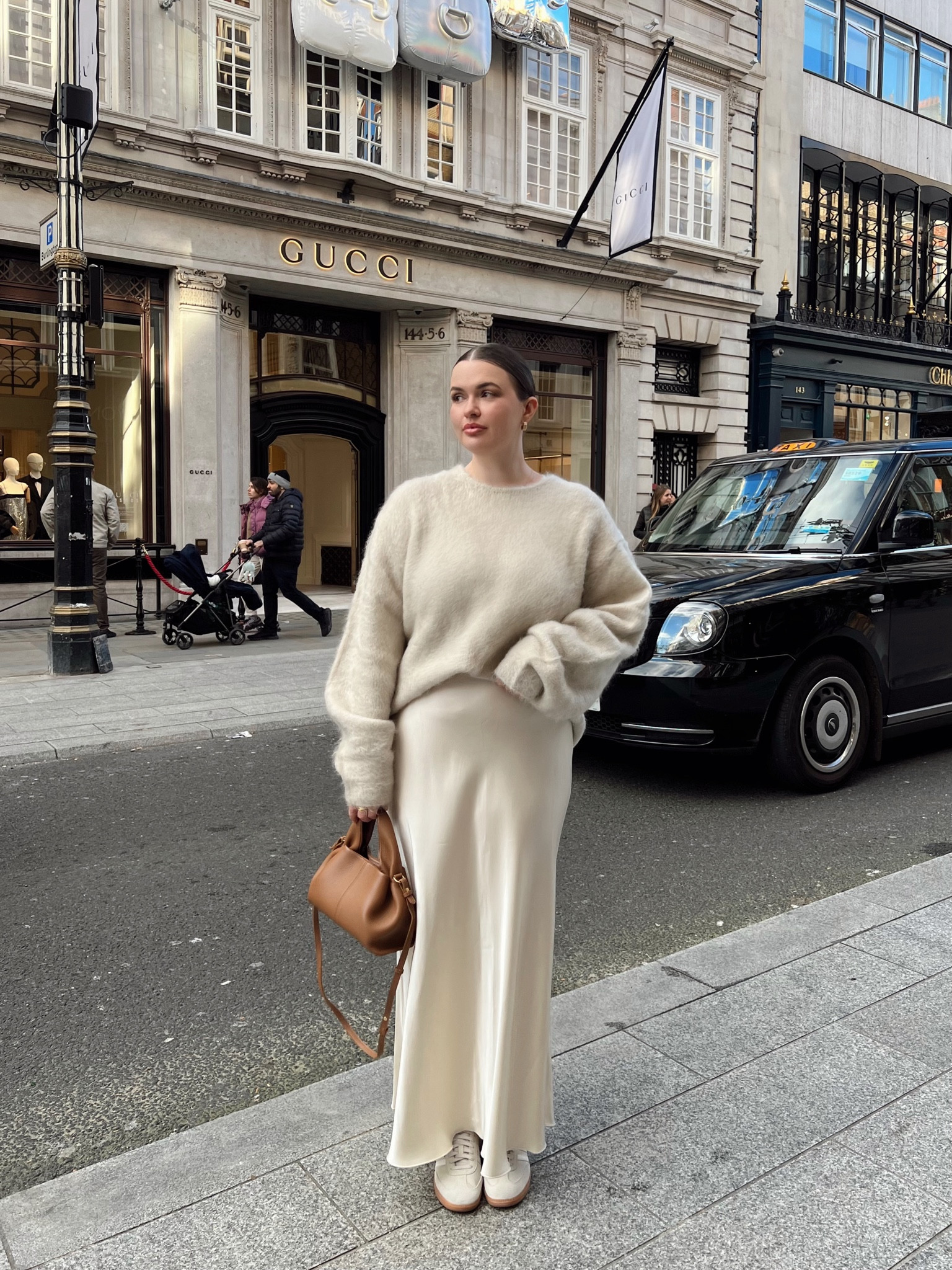All cream cosy autumn outfit - arket cream satin maxi skirt size 12/40), H&M premium cream mohair jumper (size M), beige adidas samba trainers (size up), mejuri gold hoop earrings & polene Paris mini tan handbag  

#LTKmidsize #LTKeurope #LTKstyletip