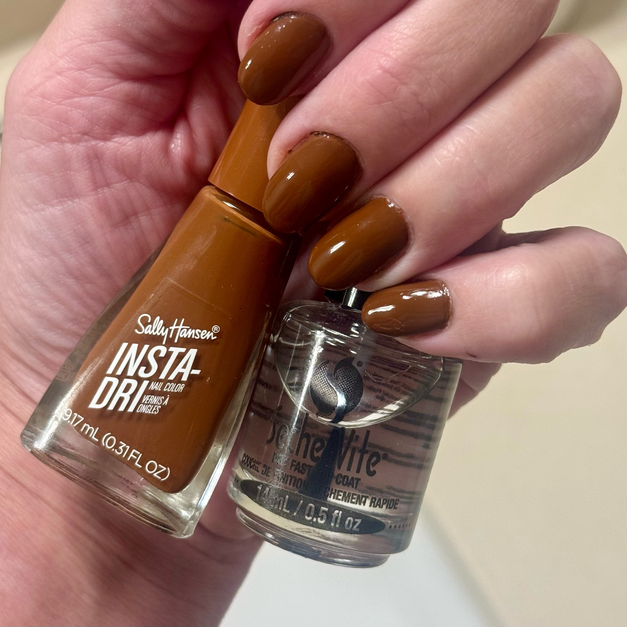 I absolutely love fall nail colors. This one from Sally Hansen is such a gorgeous warm brown. Seche Vite is my favorite top coat of all time. No light required. Quick air dry. #nails #manicure 

#LTKBeauty #LTKStyleTip