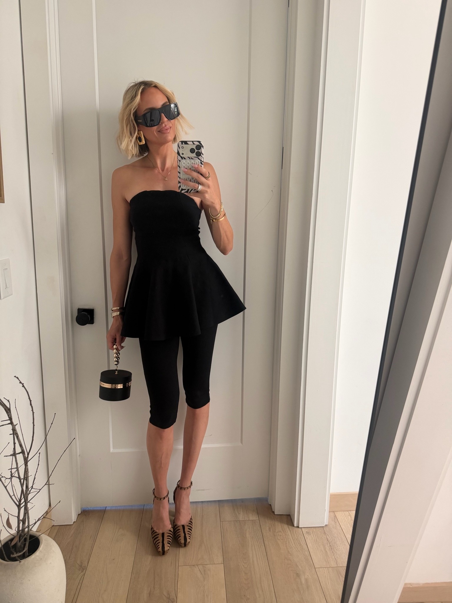 I literally threw this outfit together within five minutes. I ended up, loving it! I’m wearing a small in the top and the capris. Isn’t this clutch so fun?! It’s such a great price too. Shoes run tts￼￼

#LTKTall #LTKOver40 #LTKootd