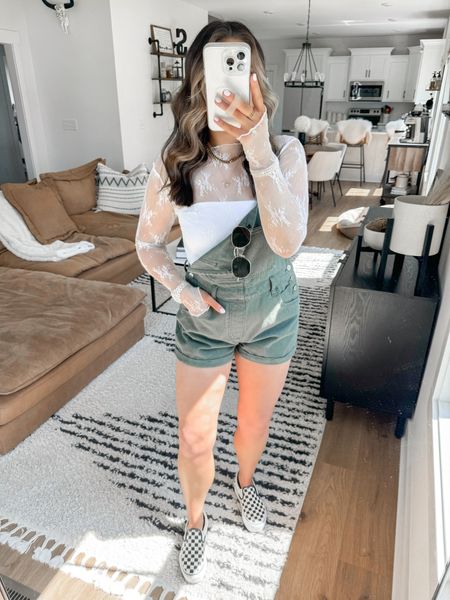 Summer Outfit Inspo 🤍 love these green overalls for summer! they come in a ton of color options too 👏🏼 I sized down one since I think they run a little big! 

Lace Top — xs
Tube Top — small
Overalls — xs

platform checkered vans slip on sneakers | free people inspired lace top | white lace long sleeve top | casual running errands outfit | spring fashion | summer fashion | shortalls outfit | overalls outfit | olive green overalls | army green overalls | brunch outfit ideas 



#LTKFindsUnder100 #LTKShoeCrush #LTKFindsUnder50