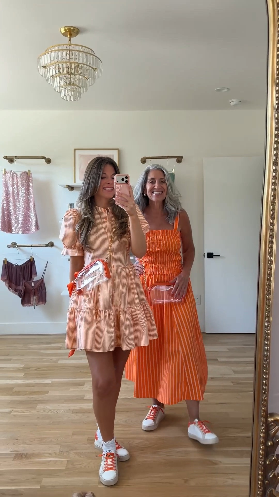 mom & me orange-and-white striped mini dress with puff sleeves, orange-and-white striped maxi dress with a smocked bodice game day looks for your next sporting event! 🏈 
avara code for 15% off: emerson 

i'm 5'4" and typically wear a small/2

mom is 5'4" and typically wears a medium/6

mom & me outfits, mom & me dresses, matching outfits, mother daughter outfits, family photo outfits, fall outfits, fall dresses, autumn outfits, midi dresses, fall dresses, casual outfits, thanksgiving outfits, family photo outfits, fall fashion, autumn fashion, cozy outfits, transitional outfits, neutral outfits, everyday outfits, weekend outfits, women’s fashion, sports, athletic, team colors, game day outfit, football outfit

#LTKSeasonal #LTKootd #LTKgrwm