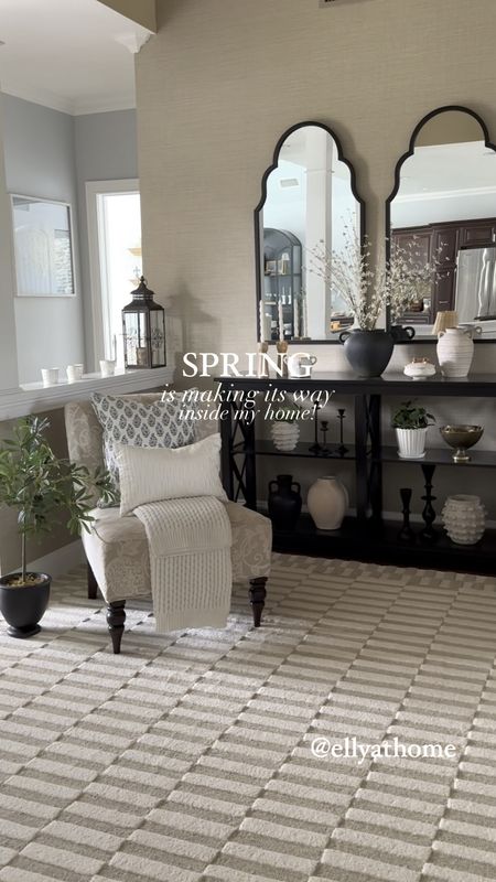 Spring entryway refresh! Shop my new neutral rug, Maria black scallop mirrors on sale, ceramics lamp, hanging basket, potted olive plant, candleholders, vases, throw pillows, spring stems, console table, accent chairs. 

#LTKhome #LTKVideo #LTKsalealert