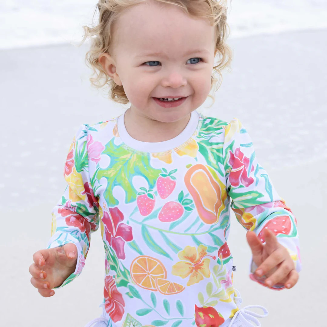 Long Sleeve Rash Guard With Ruffle Bottom | Tropical Paradise | Caden Lane