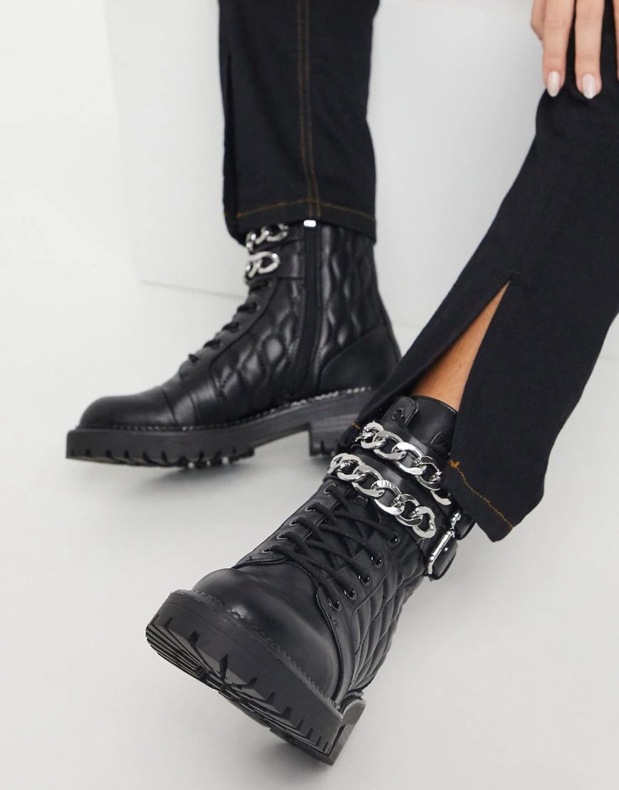 Stradivarius quilted boots with chain detail in black | ASOS (Global)