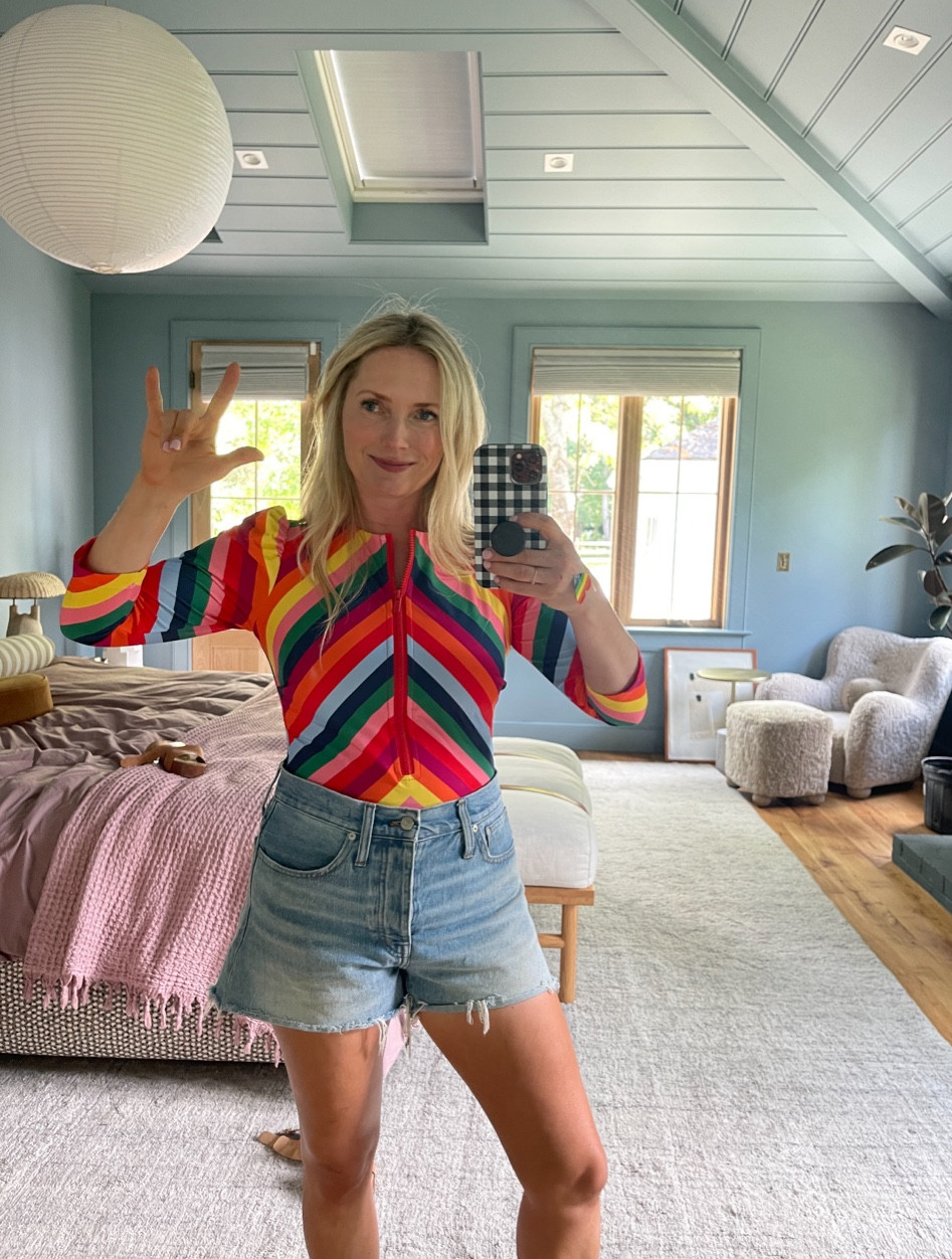 A swimsuit that can double as a body suit? I’M THERE. This sleeved zip-up suit is awesome for serious water activities (like, if you want to jet ski or boogie board, this has such secure coverage!) but it also looks so cute worn with shorts! I ended up wearing it to our neighborhood’s Pride parade, too. Happy Pride! 

#LTKswim #LTKstyletip #LTKSeasonal