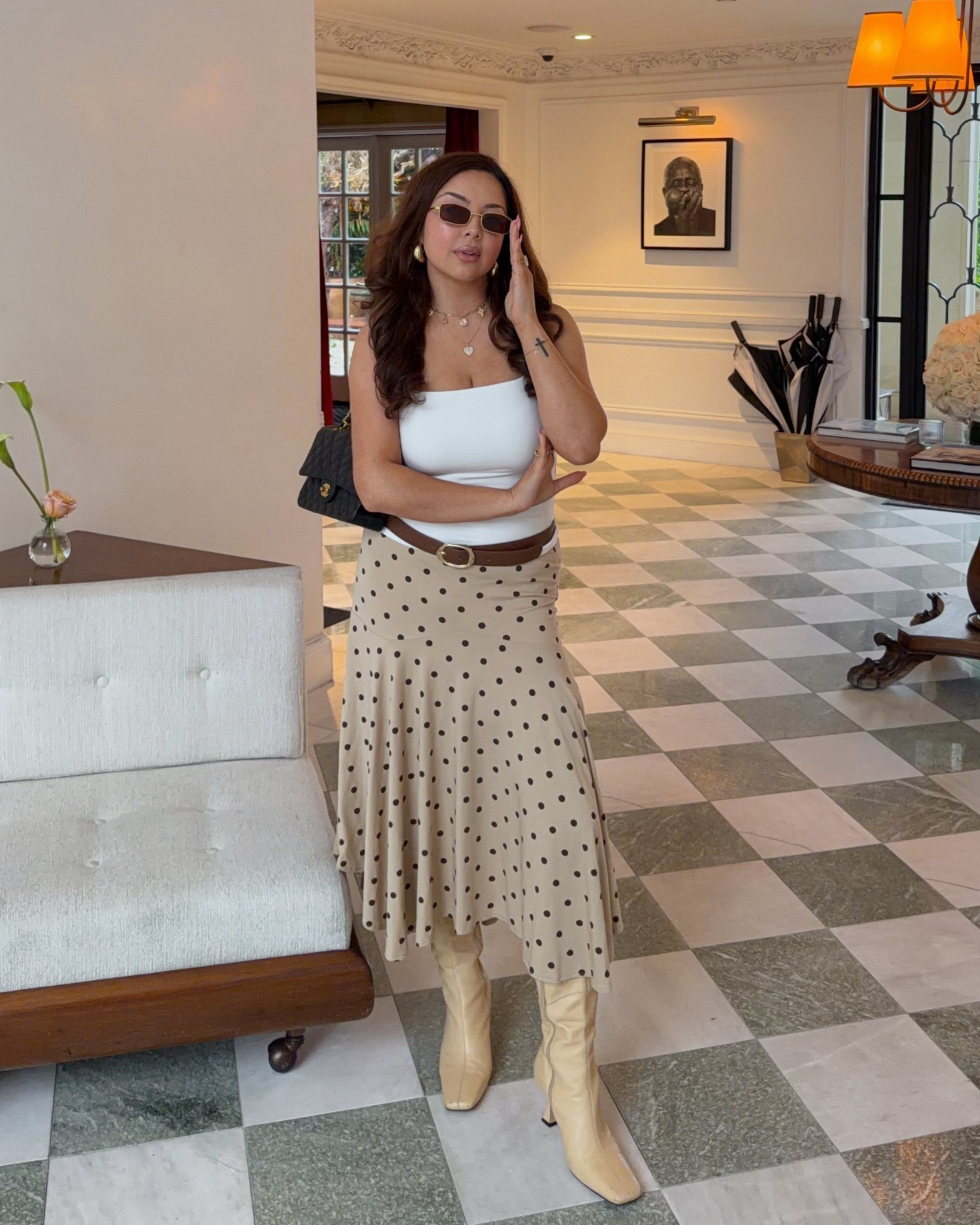 Polka dot midi skirt with white top and butter yellow boots for spring fashion, spring outfits, spring outfit idea. 

#LTKootd #LTKSaleAlert