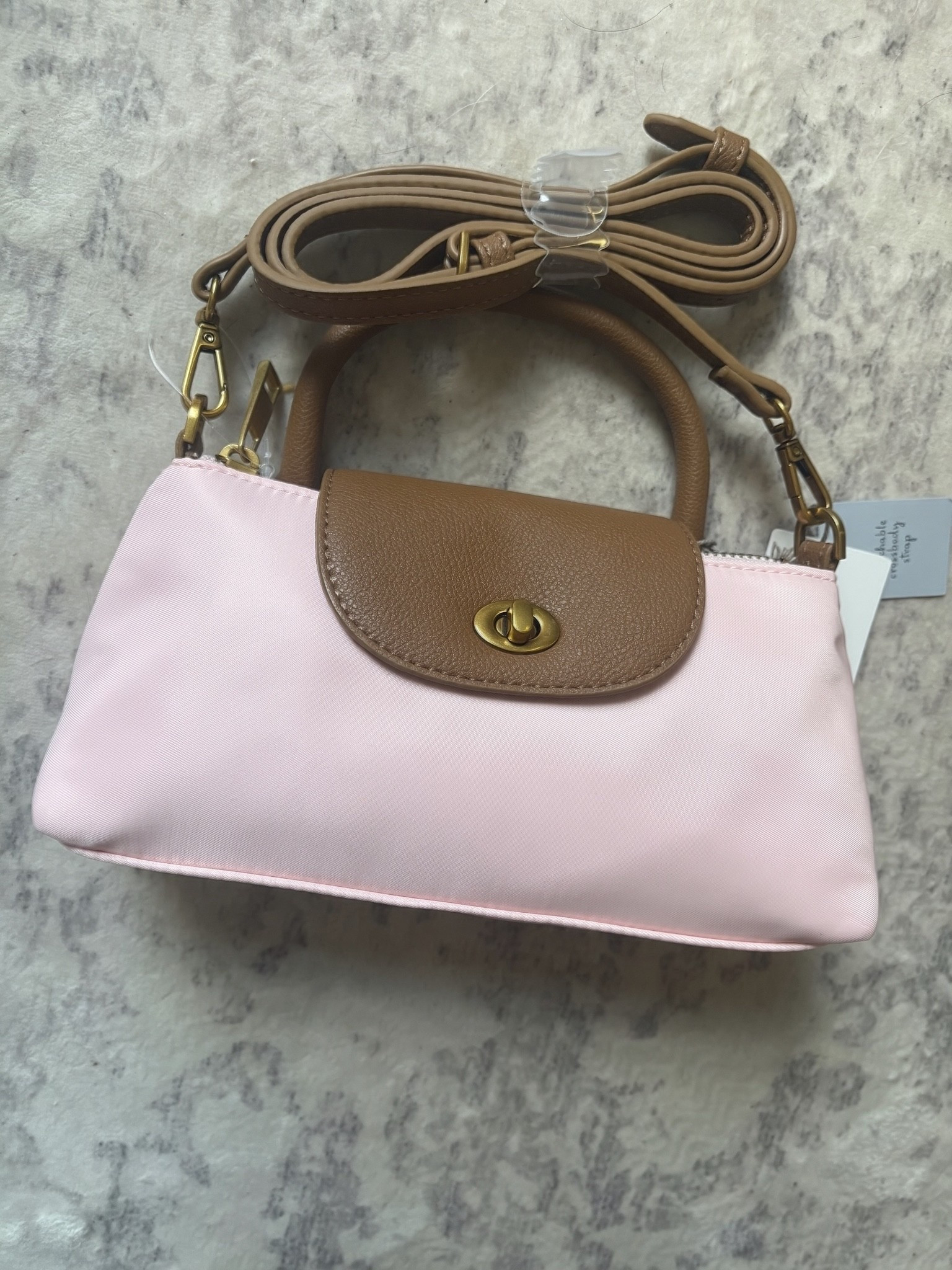 Adorable long champ look alike bag at Target. This is such a cute little nylon bag in powder pink and it’s only $20!

#LTKootd #LTKSeasonal #LTKTravel