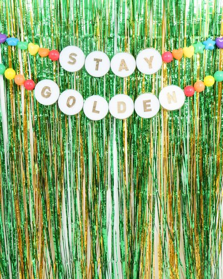 DIY Jumbo Friendship Bracelet Garland for St. Patrick’s Day! 
Taylor Swift inspired!
 STAY GOLDEN!
 
I used rainbow “beads” and gold DISCO tile edges for this oversized Taylor Swift inspired friendship bracelet party garland, doesn’t it look great with a metallic green & gold fringe backdrop!
❤️❤️❤️

Full tutorial & tips on my Instagram & blog ( for both my Christmas Era & Valentine’s Day garlands too)
❤️❤️❤️
❤️❤️❤️
#taylorswift #taylorswiftfriendshipbracelets #friendshipbracelet #
#swift #swifties #swiftieforever #taylorswiftinspired #taylorswiftparty #swiftieforever #jumbofriendshipbracelet

#LTKSeasonal #LTKparties #LTKfamily