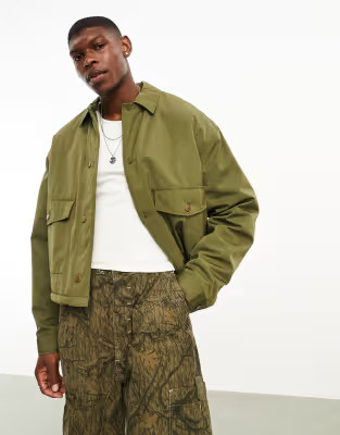 ASOS DESIGN cropped worker jacket with teddy lining in green | ASOS (Global)