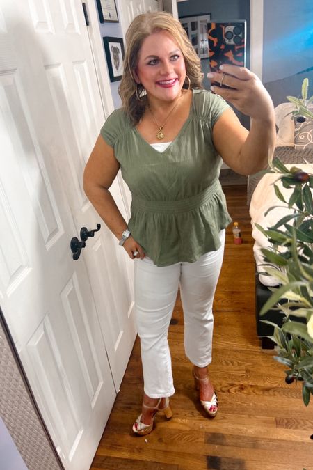 Spring fever in full effect over here. 
This gauzy- stretchy top is very comfortable and very flattering. It also looks adorable with jean shorts. Here, I paired it with a crisp new pair of white jeans and gold platform sandals. This is likely to be my St. Patrick’s Day outfit.
Spring outfits, work outfits, affordable clothes, affordable fashion, high heels 

#LTKover40 #LTKfindsunder50 #LTKSeasonal